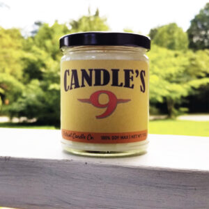 Hoppe's No. 9 type of scented soy container candle.